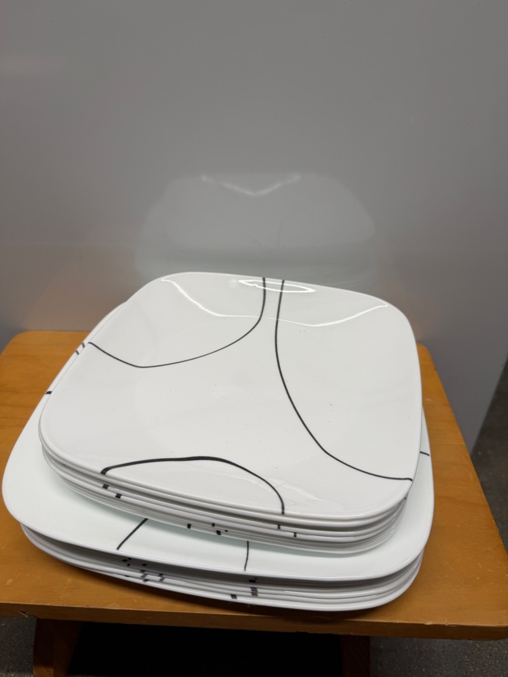 TCorelle Square Simple Lines minimalist white design with black curved accents